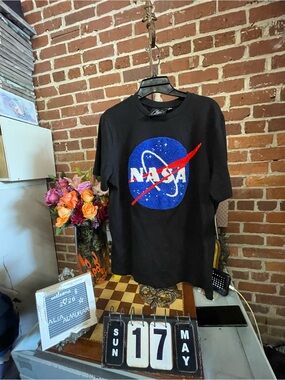NASA graphic t-shirt featuring an embroidered textured logo.
